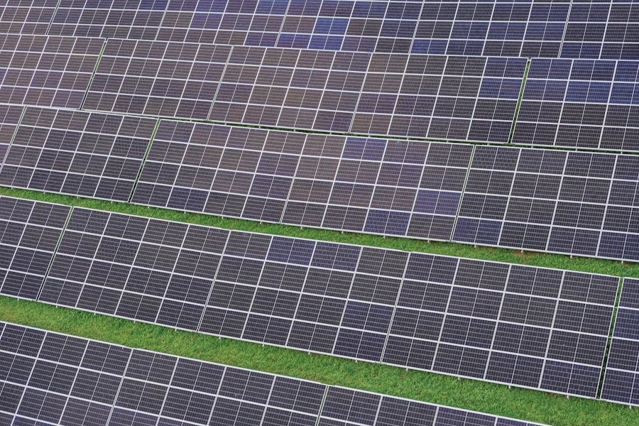 Diagonal rows of photovoltaic panels in close perspective