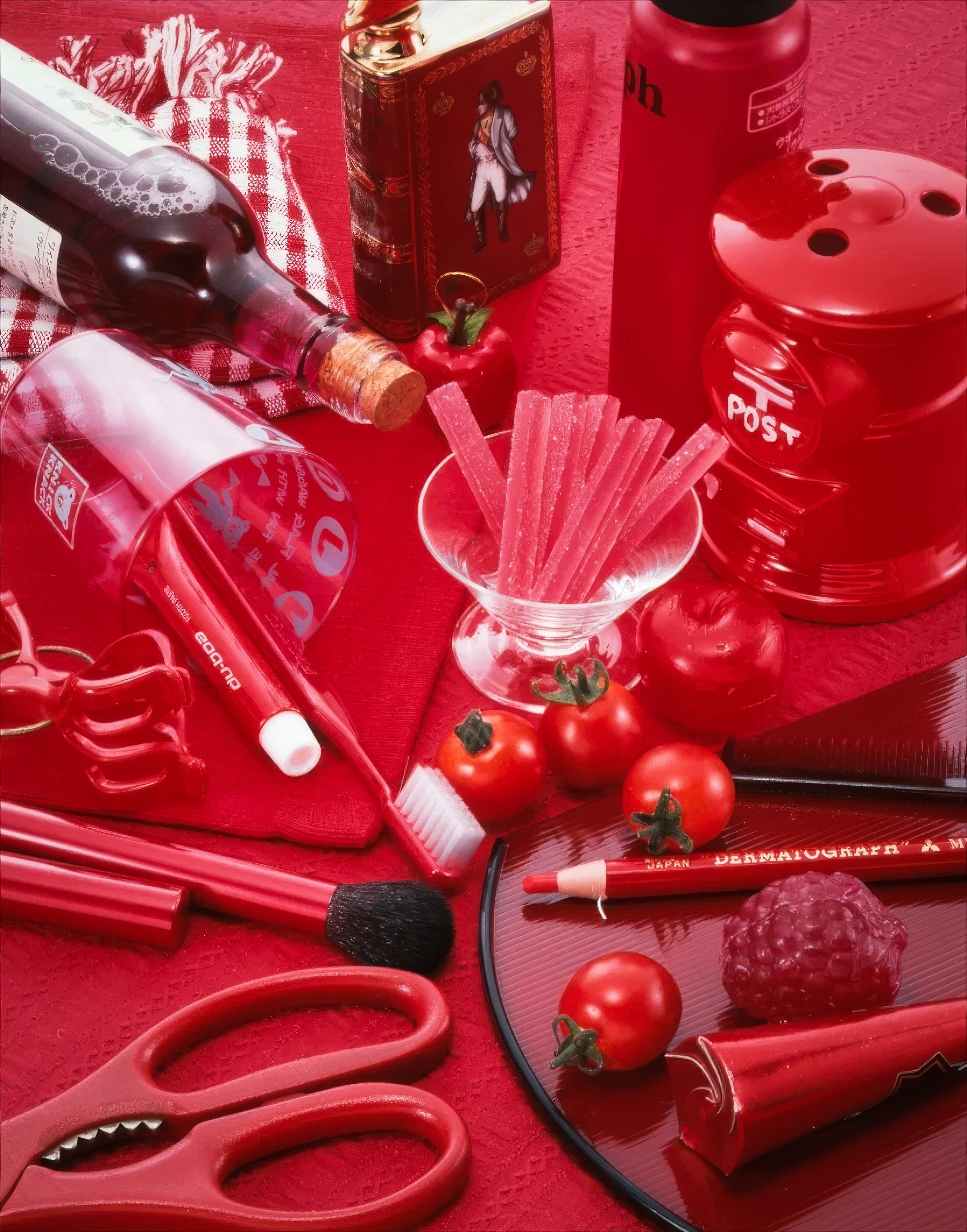A table topped with lots of red items