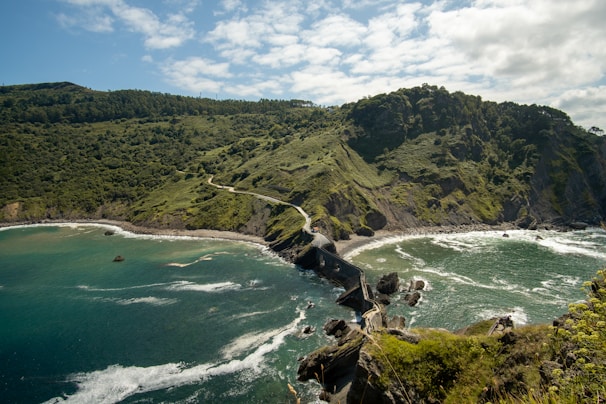 A scenic view of the ocean from a cliff