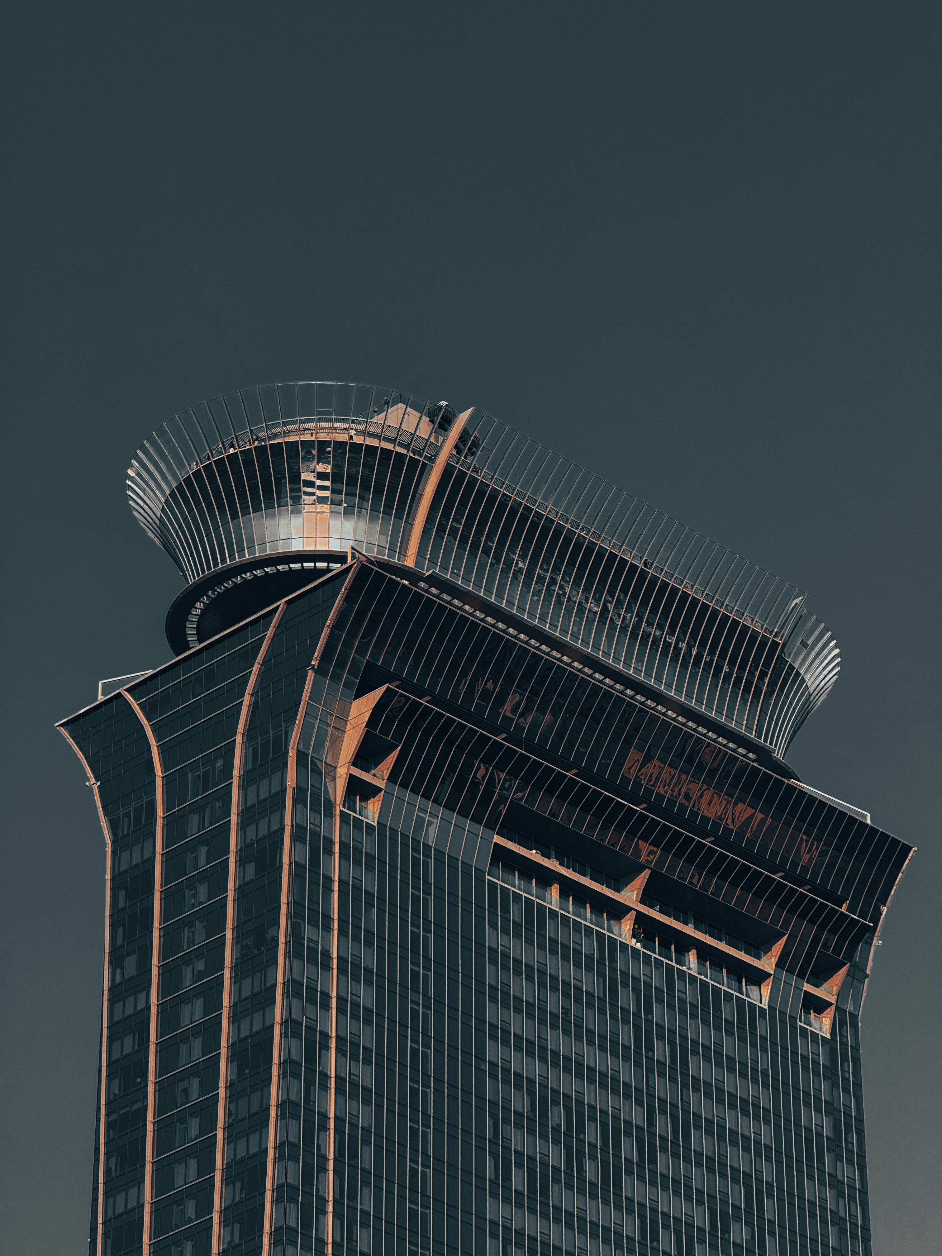 A very tall building with a sky background