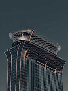 A very tall building with a sky background