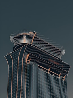 A very tall building with a sky background