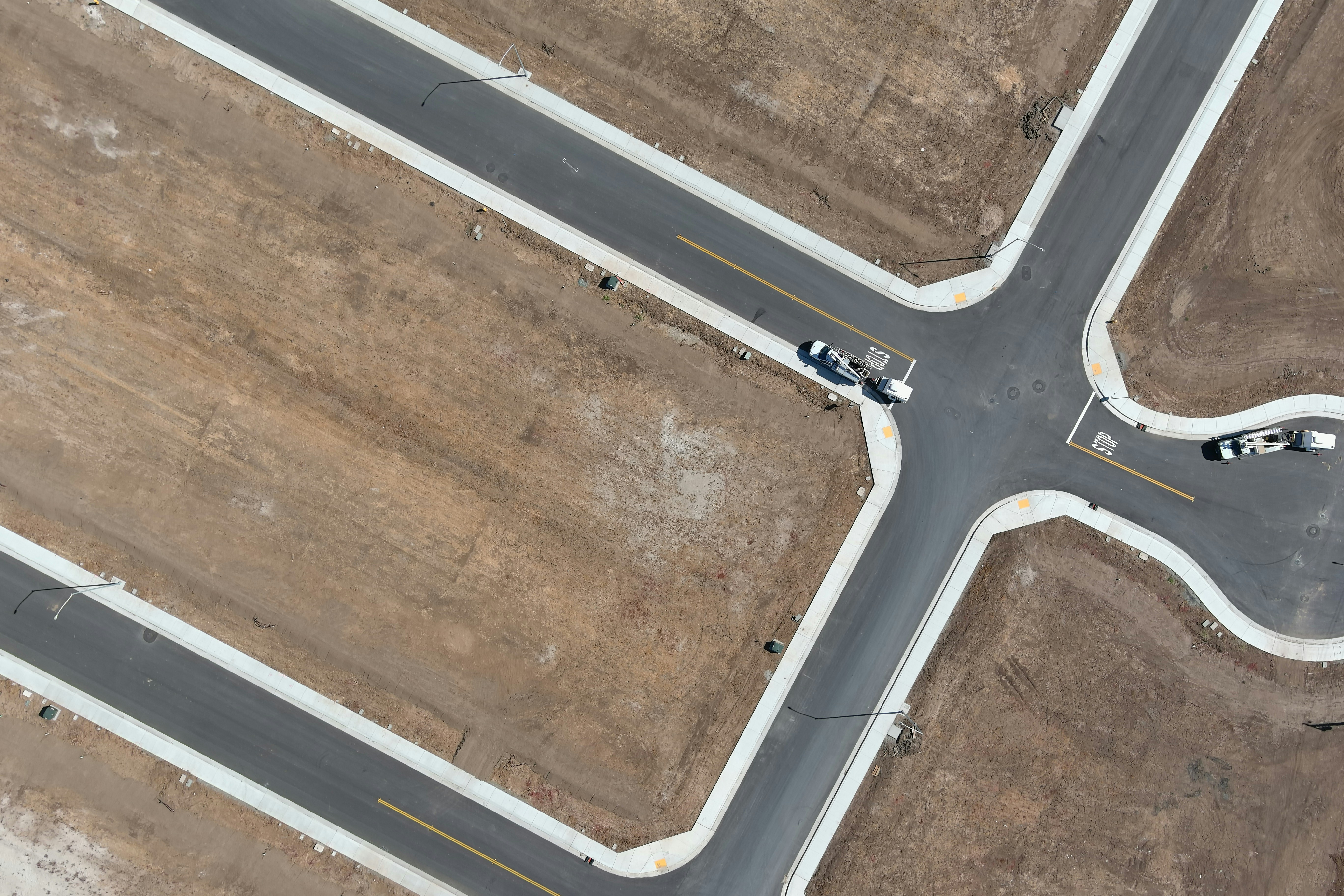 An aerial view of a four way intersection