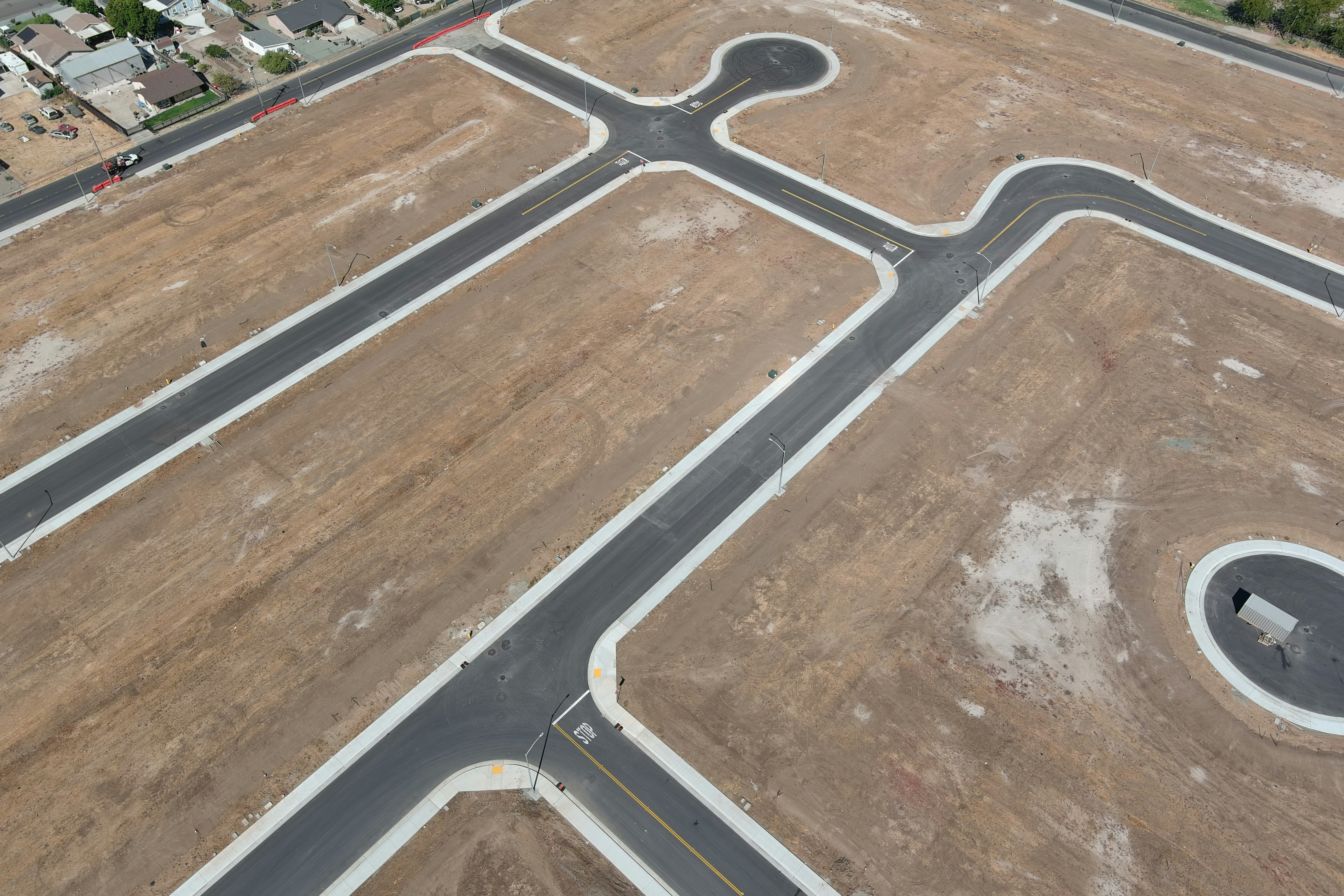 An aerial view of a road intersection in the middle of nowhere