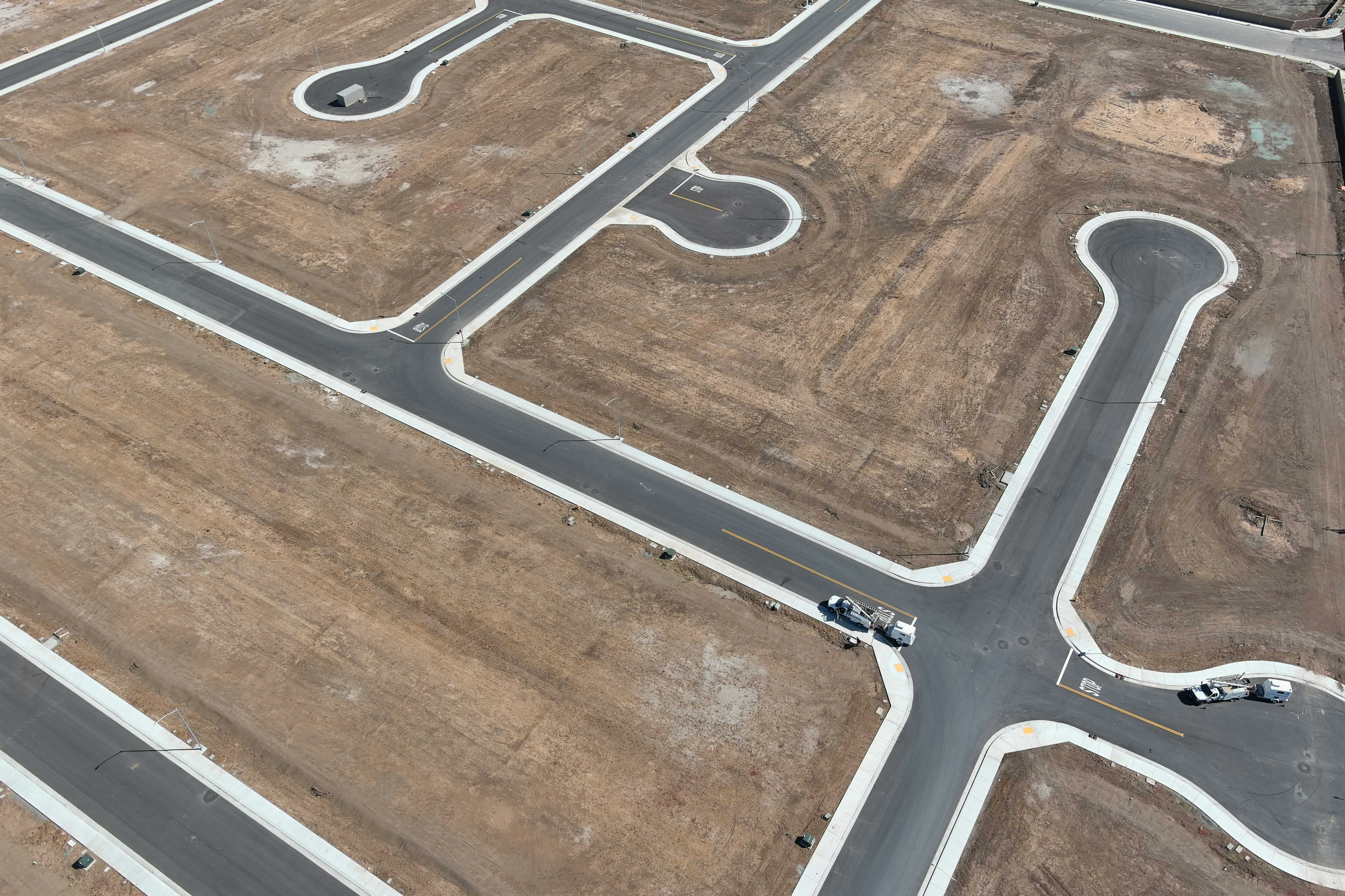 An aerial view of an airport with a runway