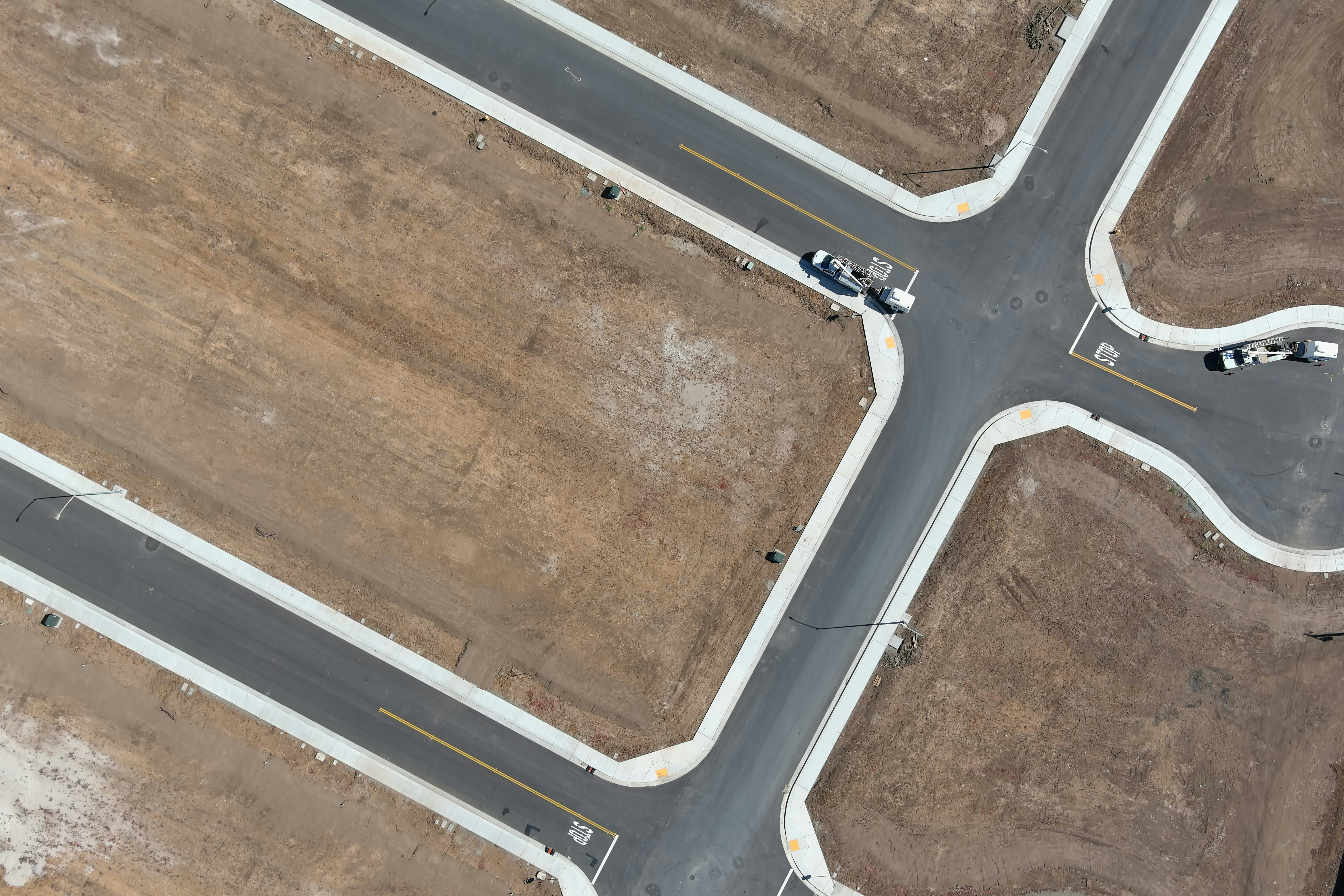 An aerial view of a four way intersection