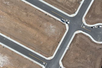 An aerial view of a four way intersection
