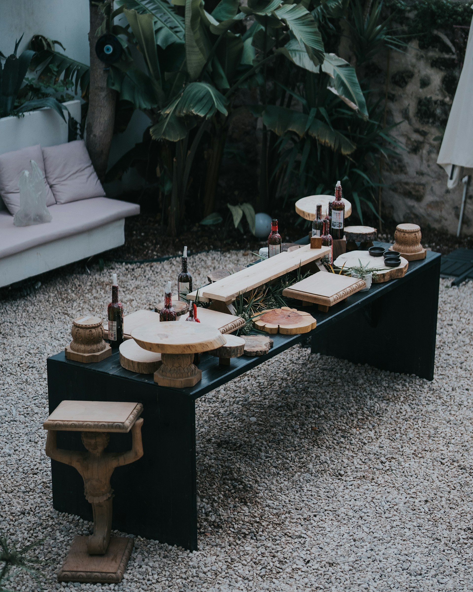 A table that has a bunch of bottles on it