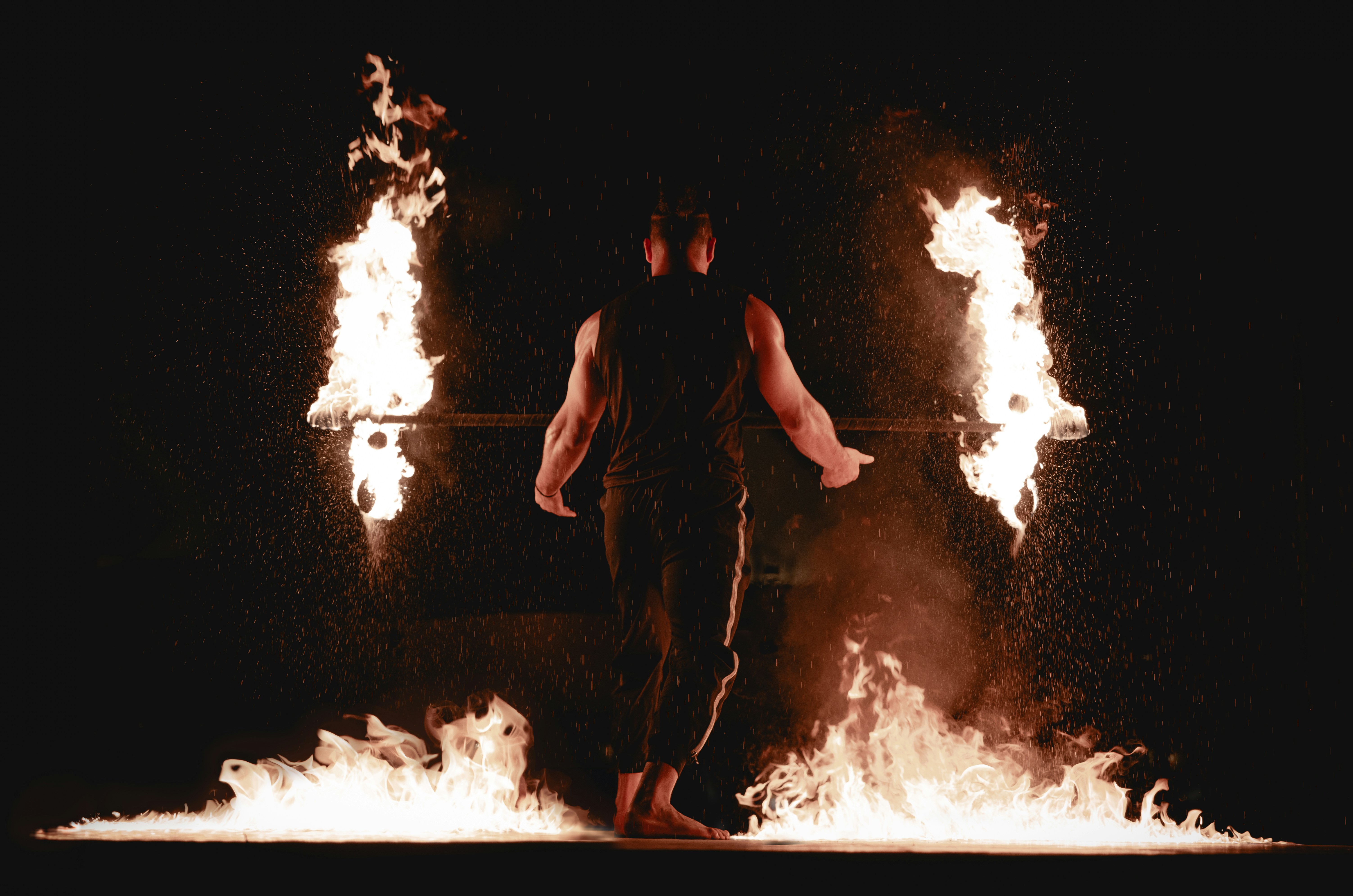 woman wearing yellow long-sleeved dress under white clouds and blue sky during daytime