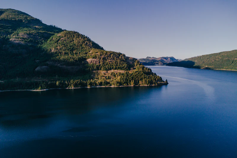 Open water ringed by mountains at Lake Country