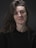 A woman with long hair and a black shirt