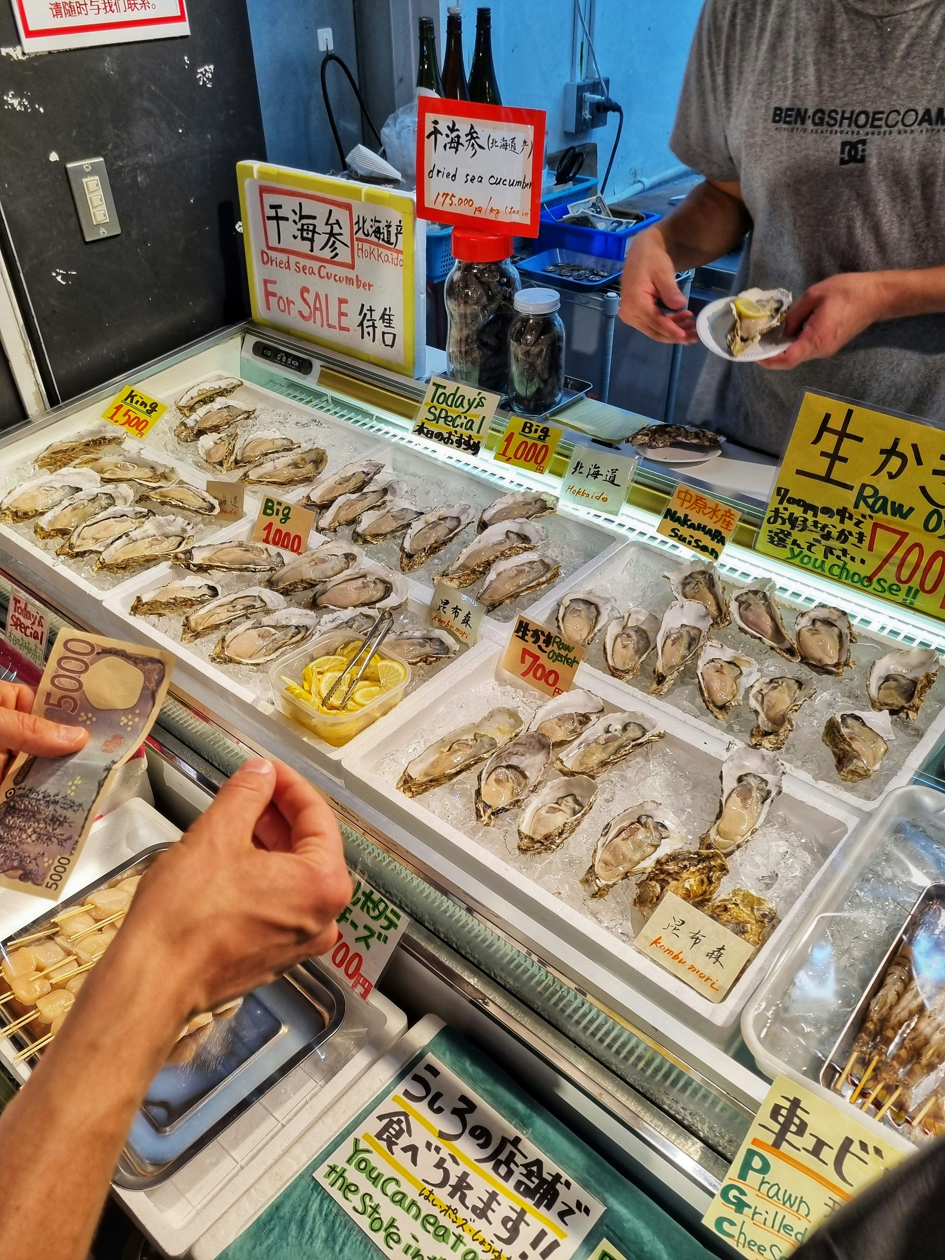 Fresh oysters on ice at the seafood counter