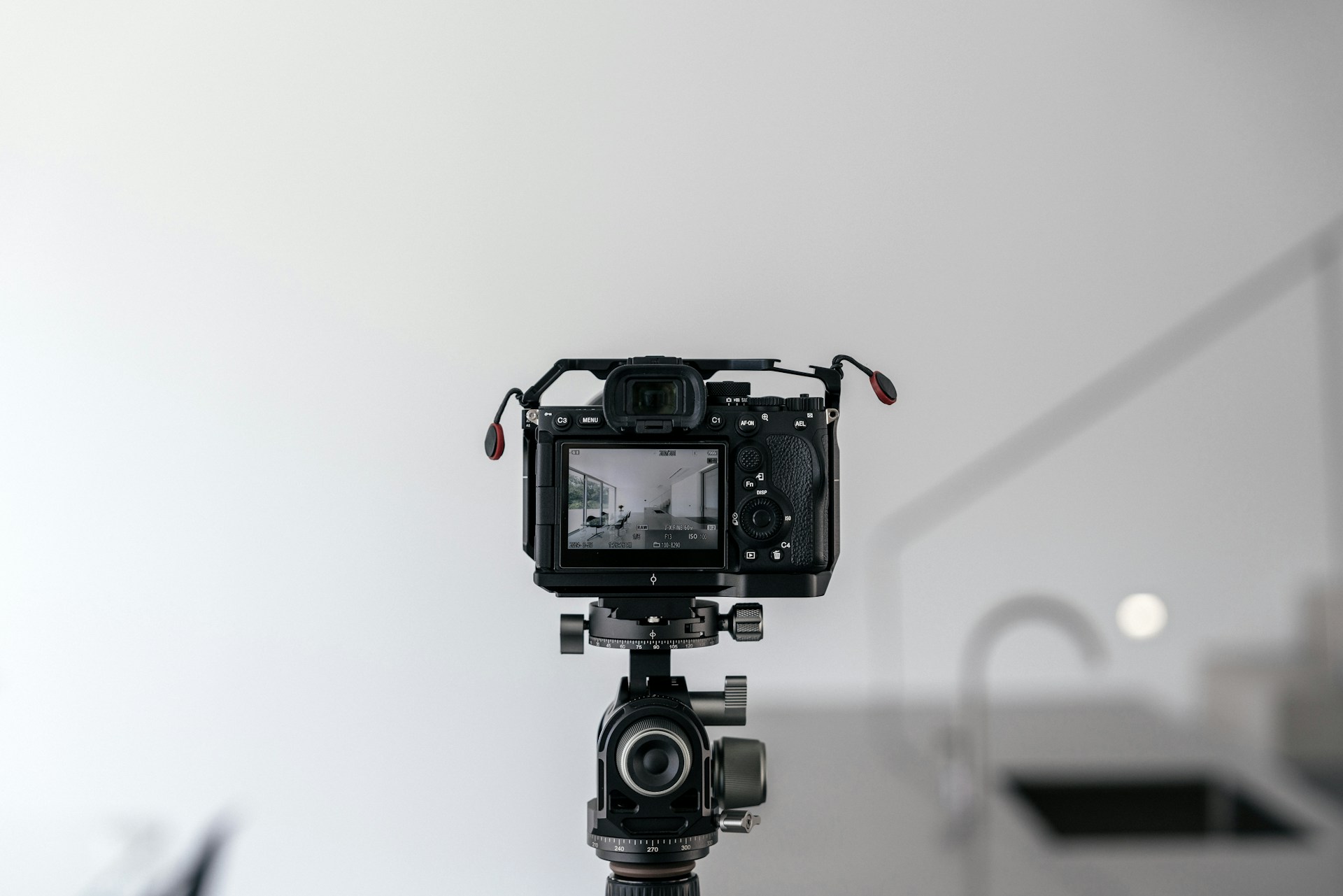 A camera on a tripod in a room