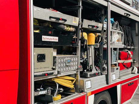 A red fire truck parked on the side of the road