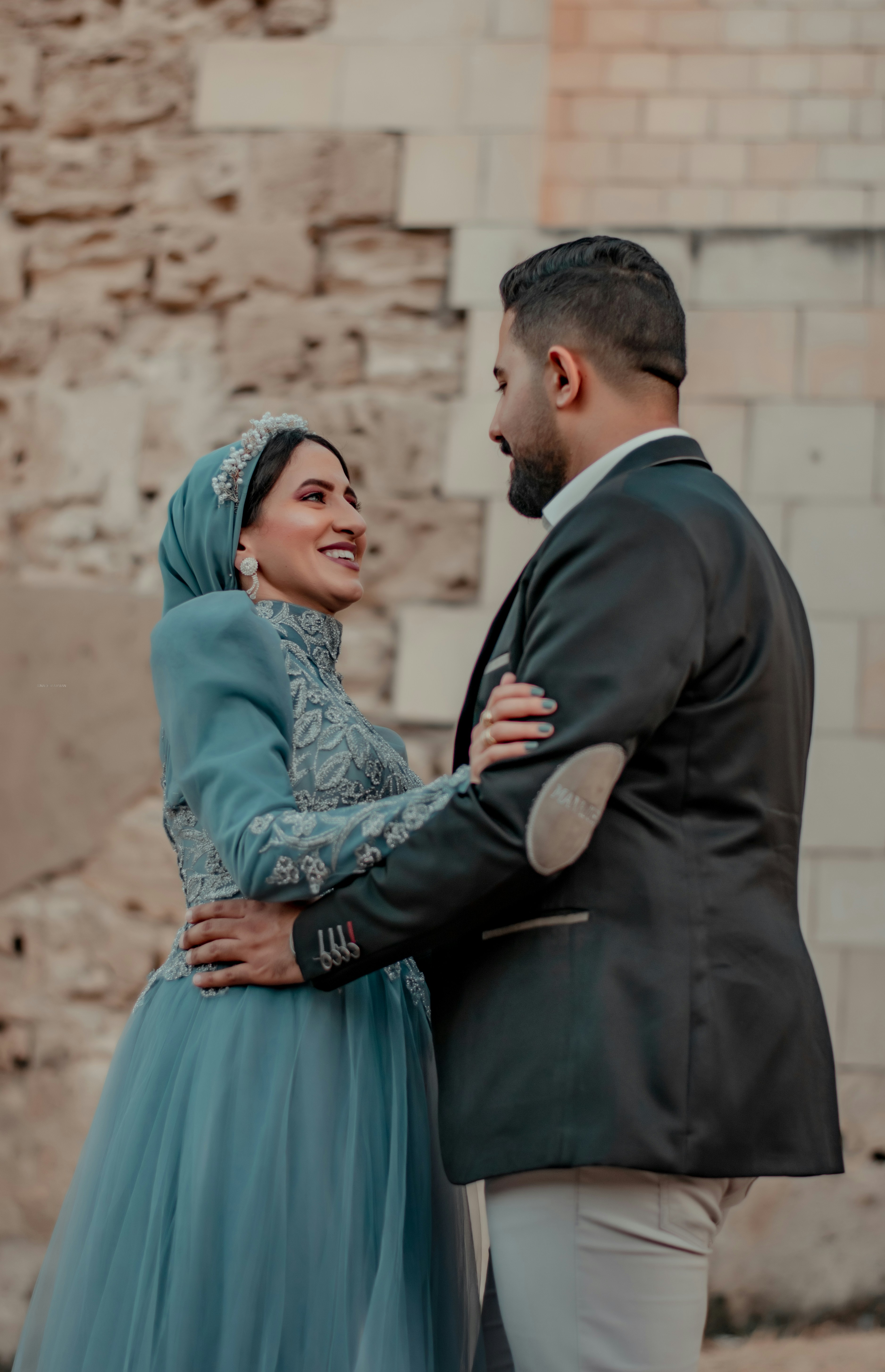 A man and a woman standing next to each other