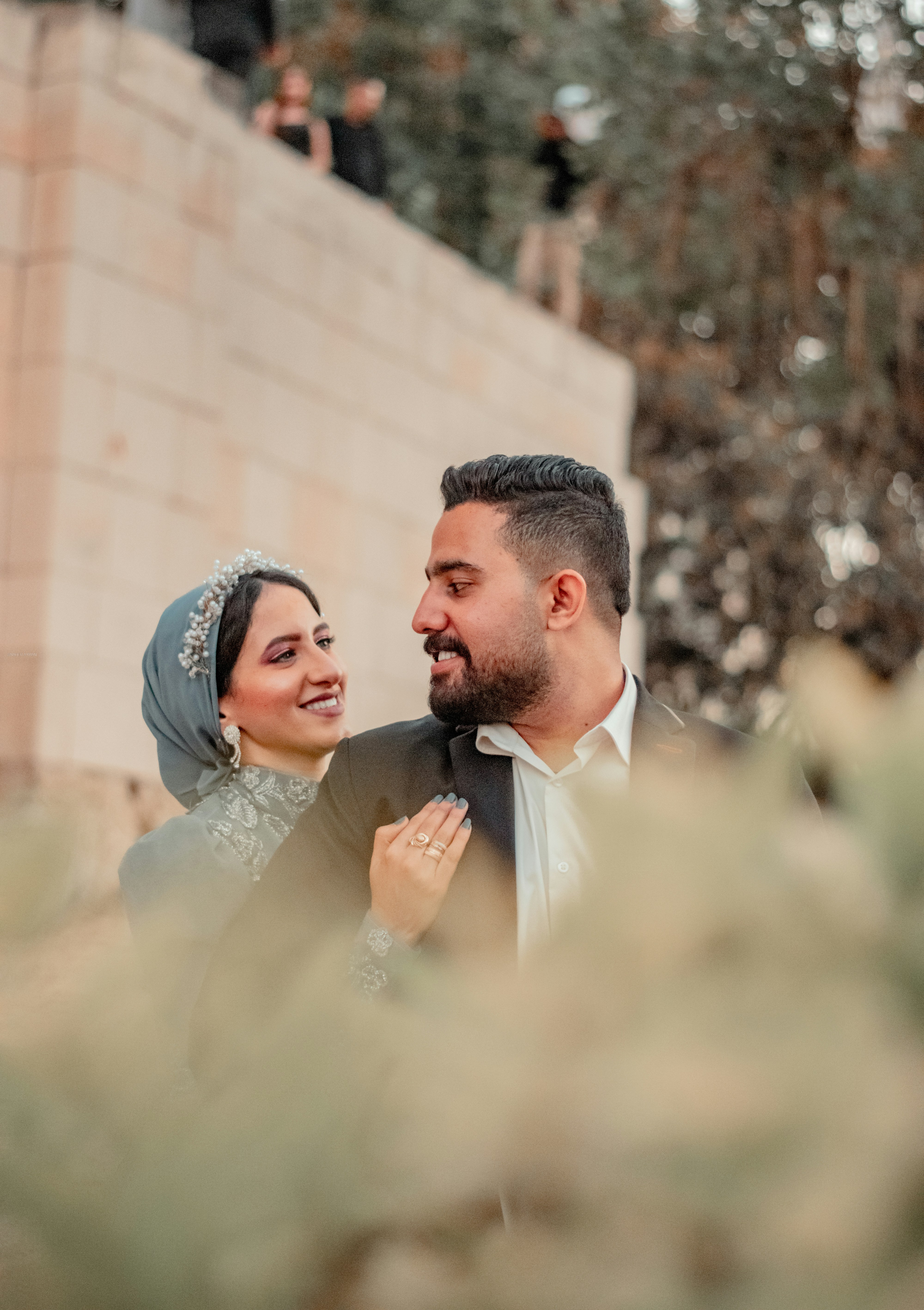A man and a woman standing next to each other