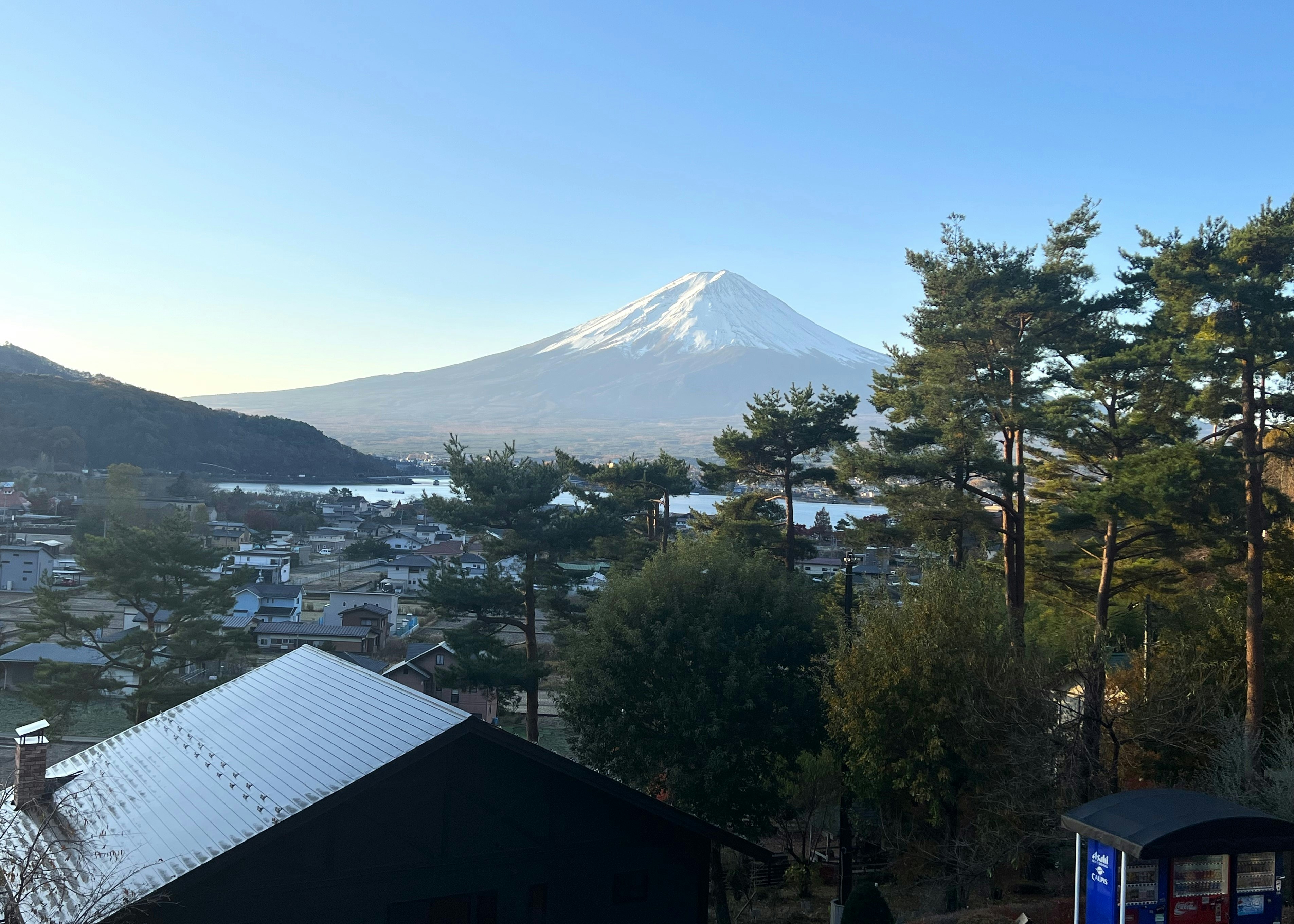 A view of a snow covered mountain in the distance