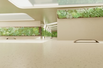 A kitchen counter with a sink and a window