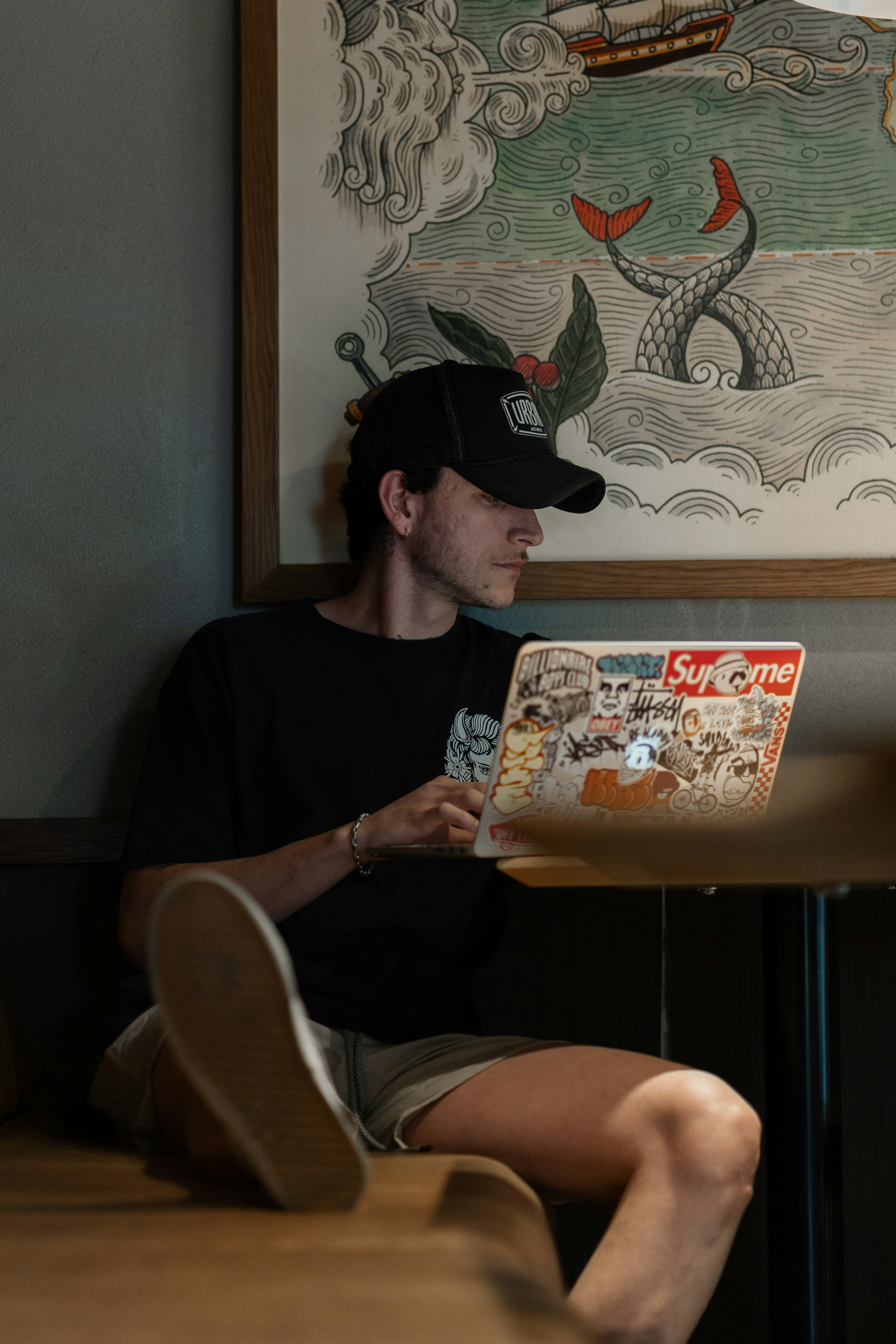 Freelance writer at a cafe with laptop