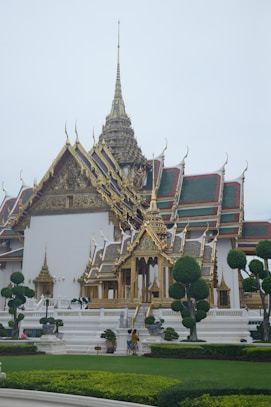 A large building that has a lot of gold on it