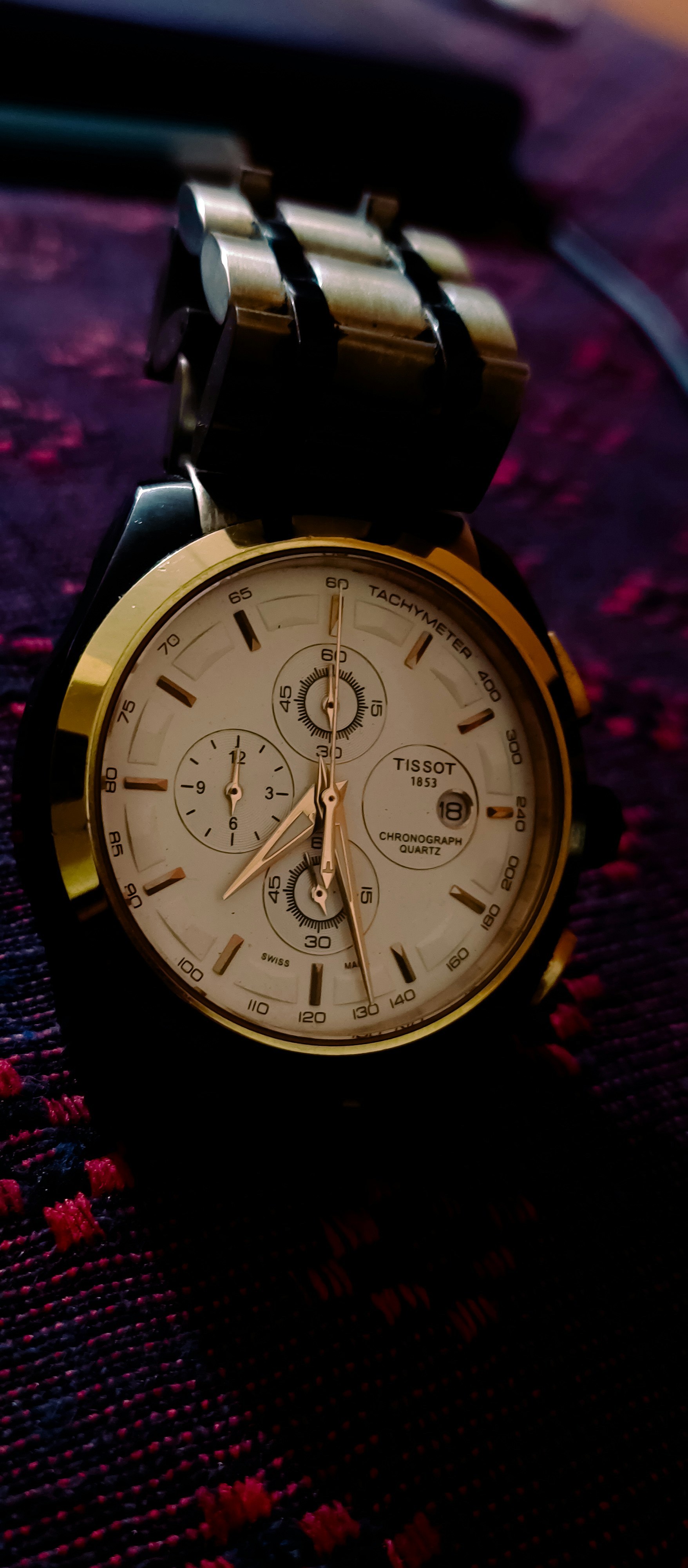 A close up of a watch on a table