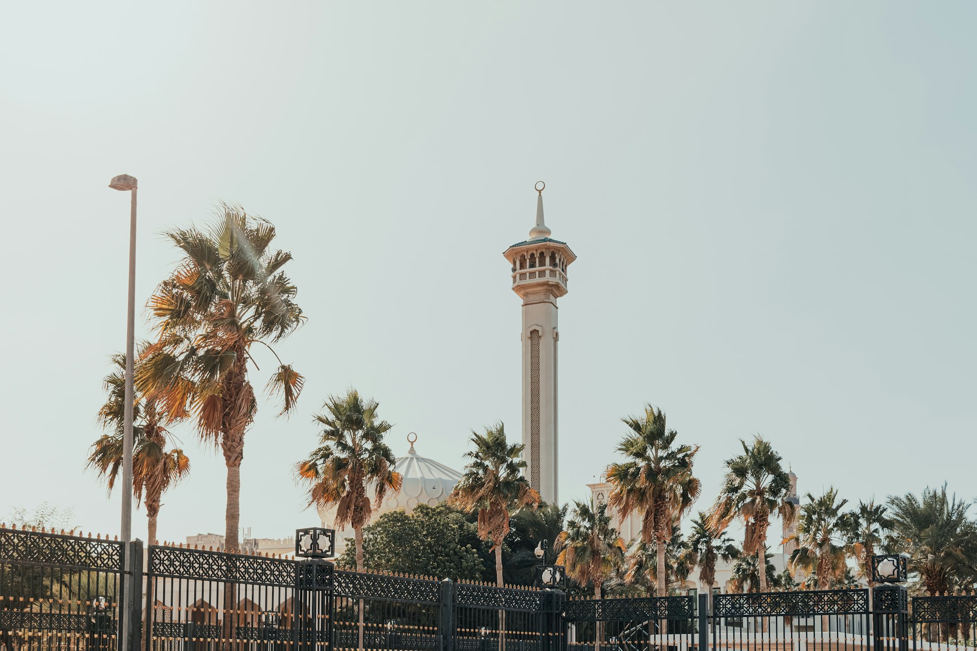 A tall tower with a clock on top of it
