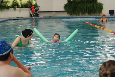 A group of people in a swimming pool