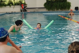 A group of people in a swimming pool