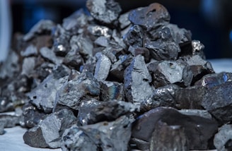 A pile of coal sitting on top of a table