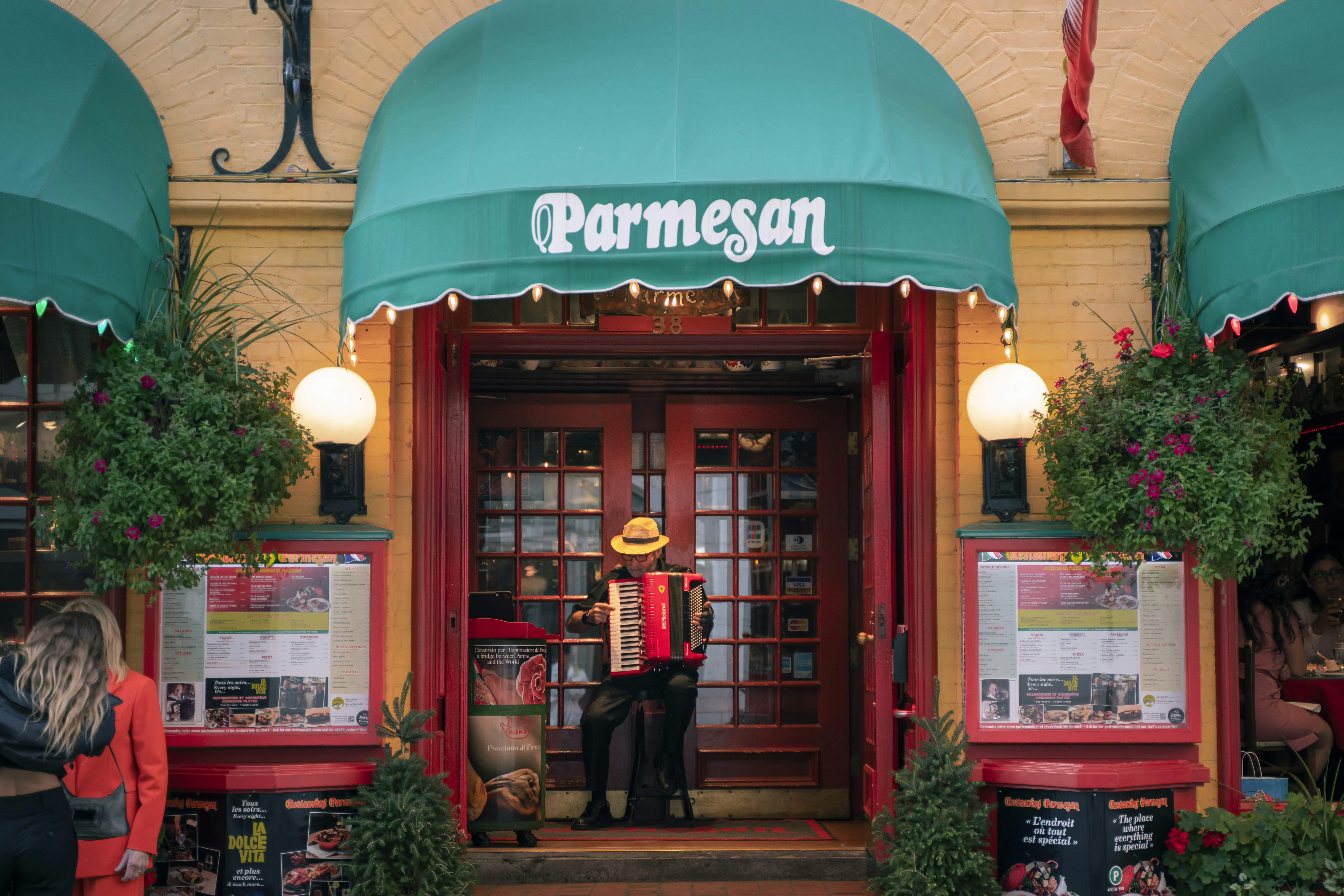 A person standing in front of a book store