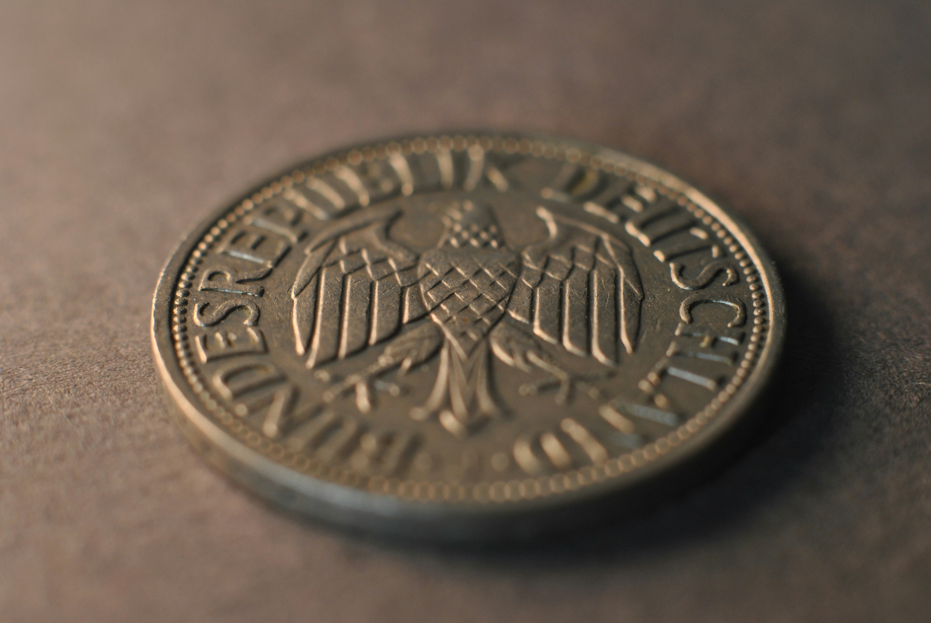 A close up of a coin on a table