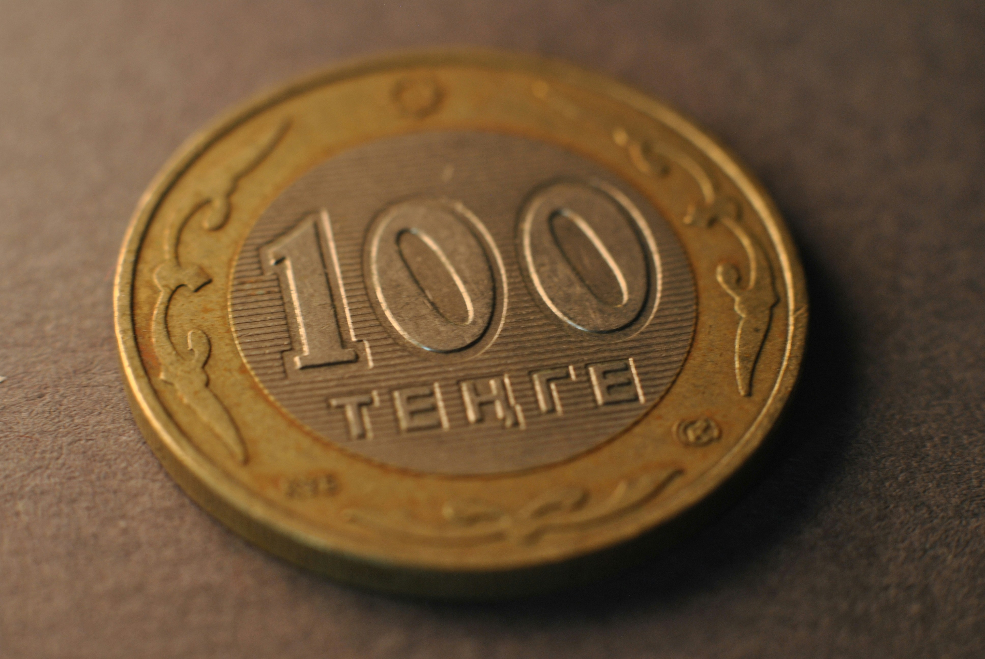 A close up of a coin on a table
