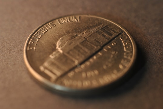 A close up of a coin on a table