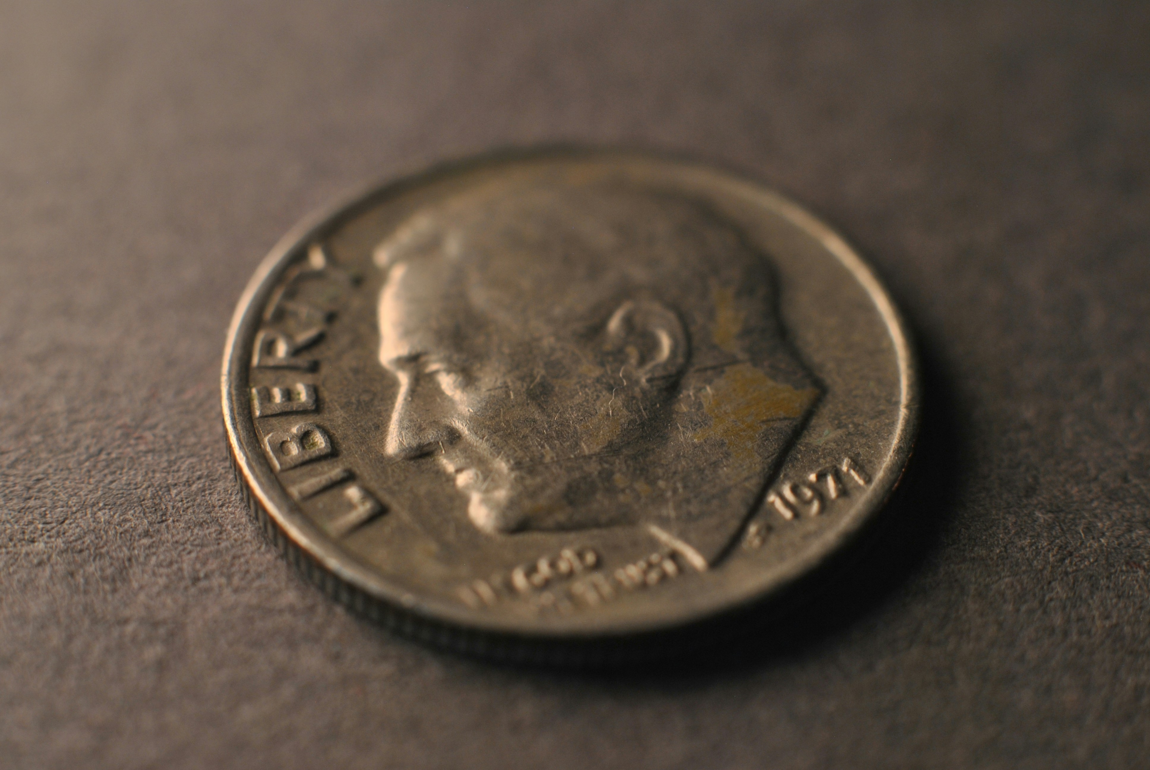 A close up of a coin on a table