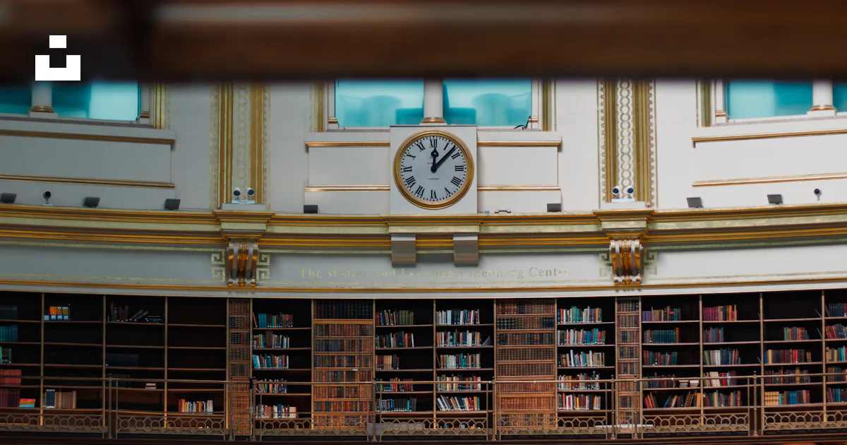 Library Clock Face A clock on the wall of a library photo – Free Wallpaper Image on Unsplash