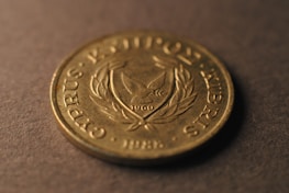 A close up of a coin on a table