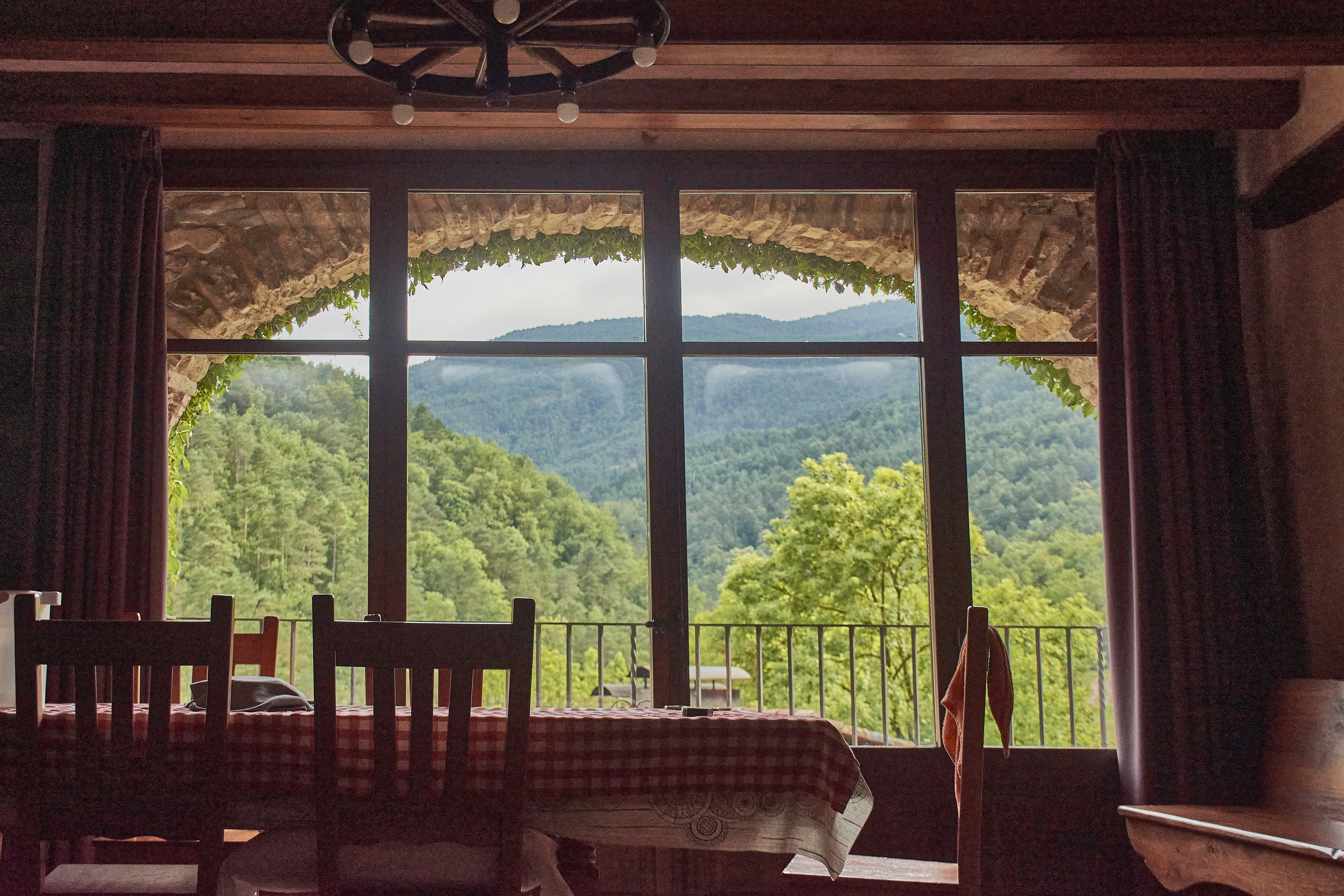 A dining room with a view of the mountains