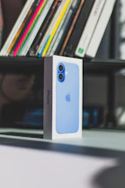 A blue and white box sitting on top of a table