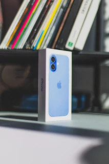 A blue and white box sitting on top of a table