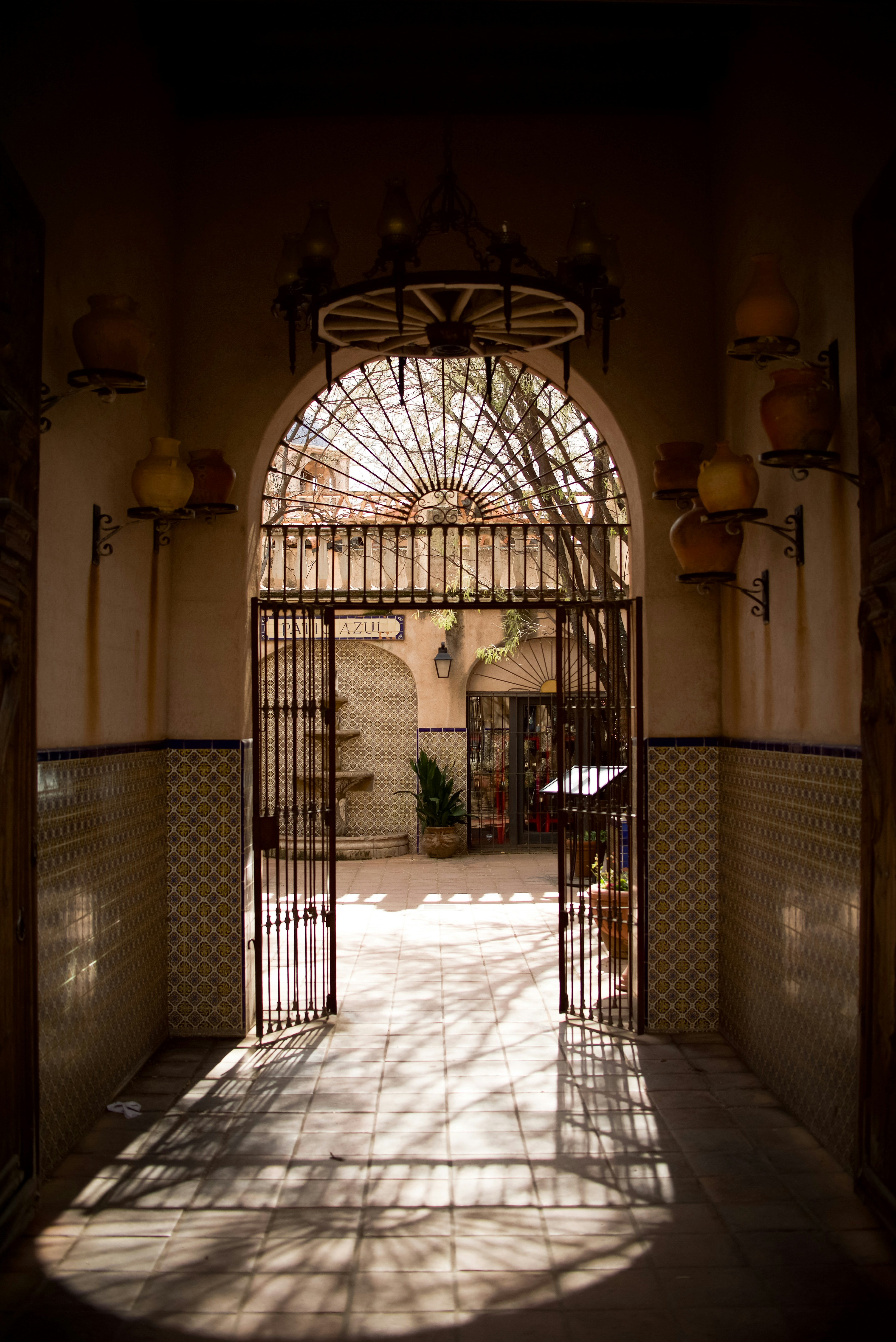 An open gate leading into a courtyard