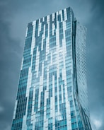 A very tall building with a sky background