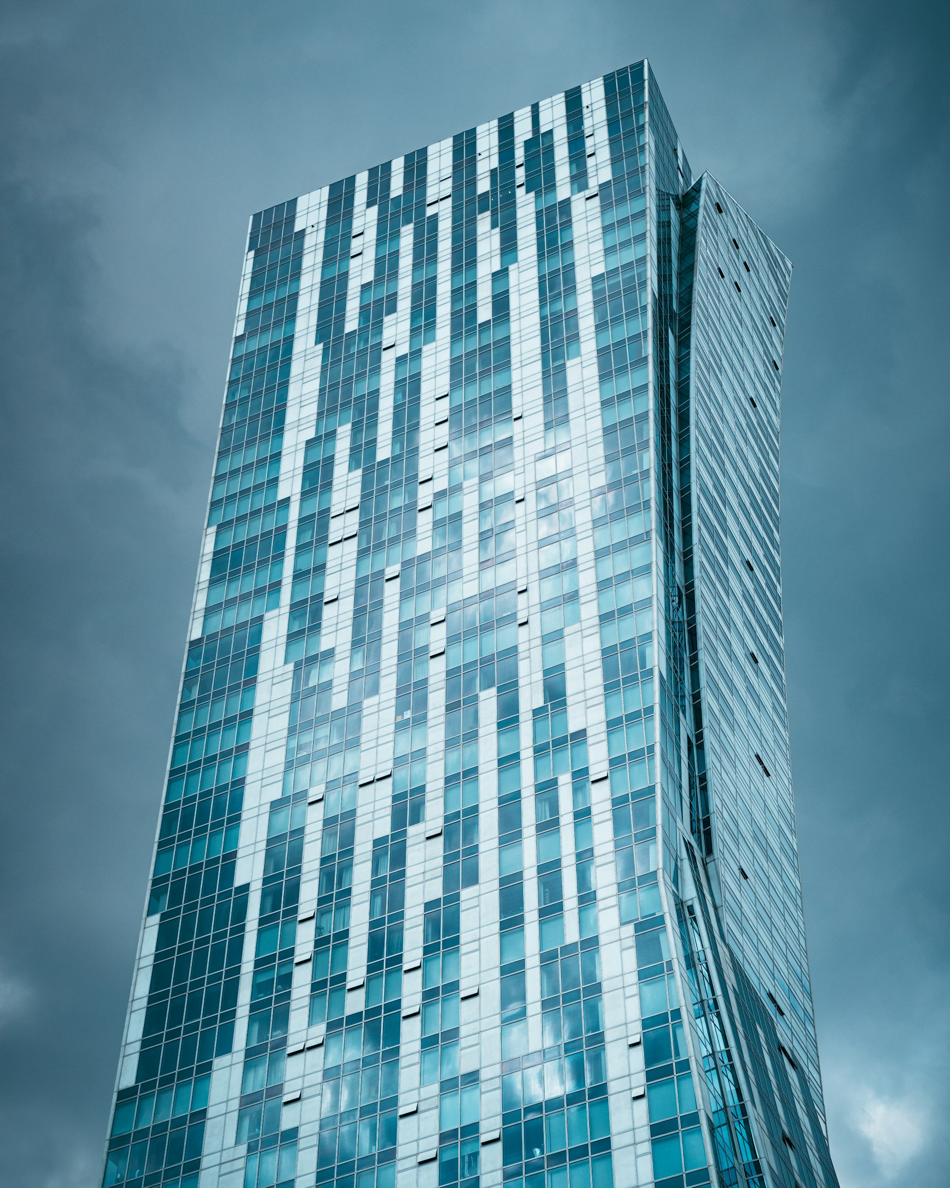 A very tall building with a sky background