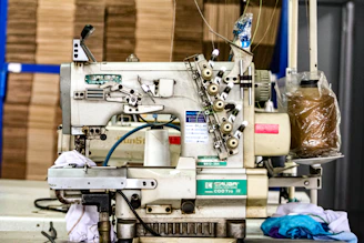 A flatlock sewing machine sitting on top of a table