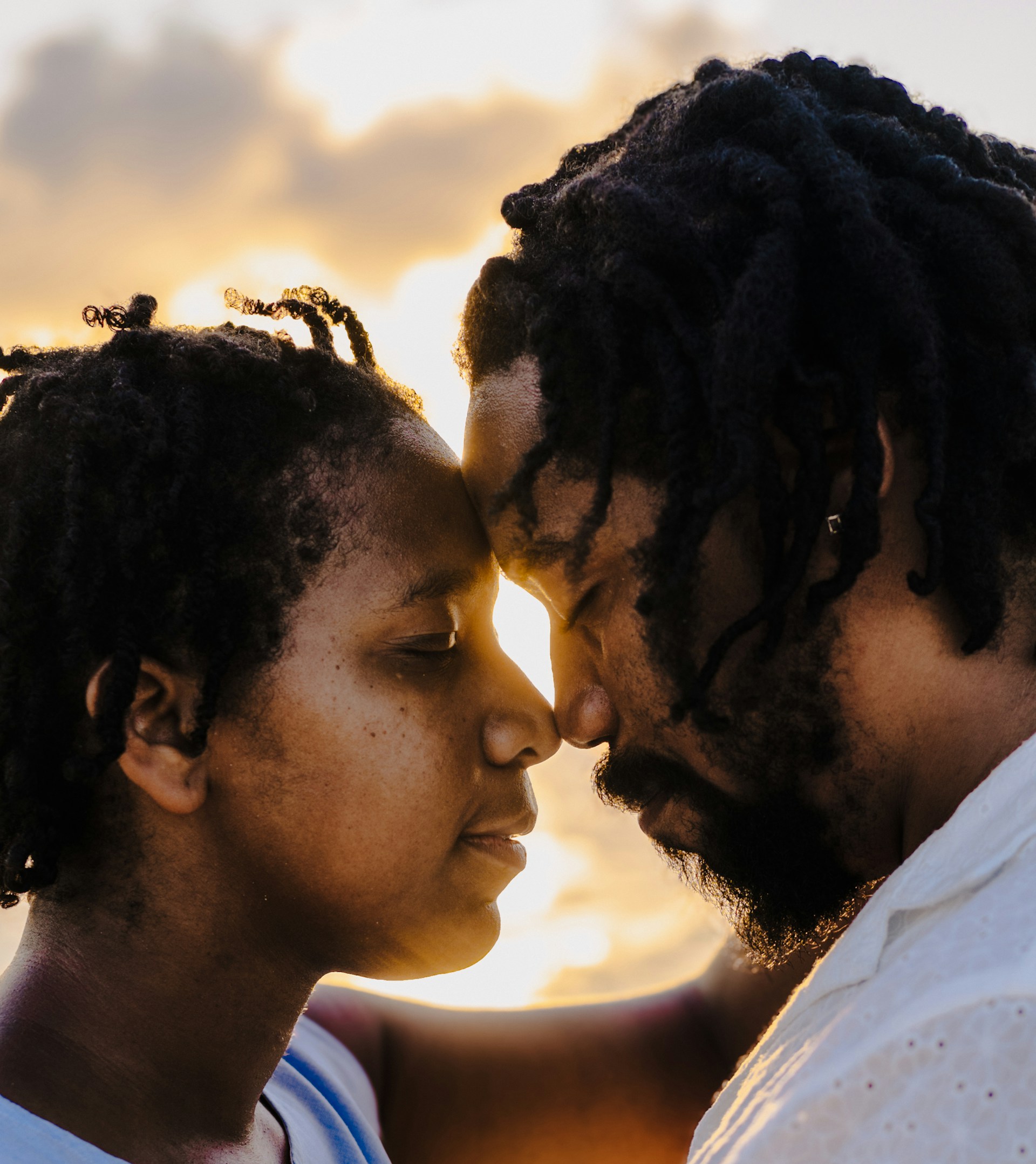 A man and a woman standing next to each other