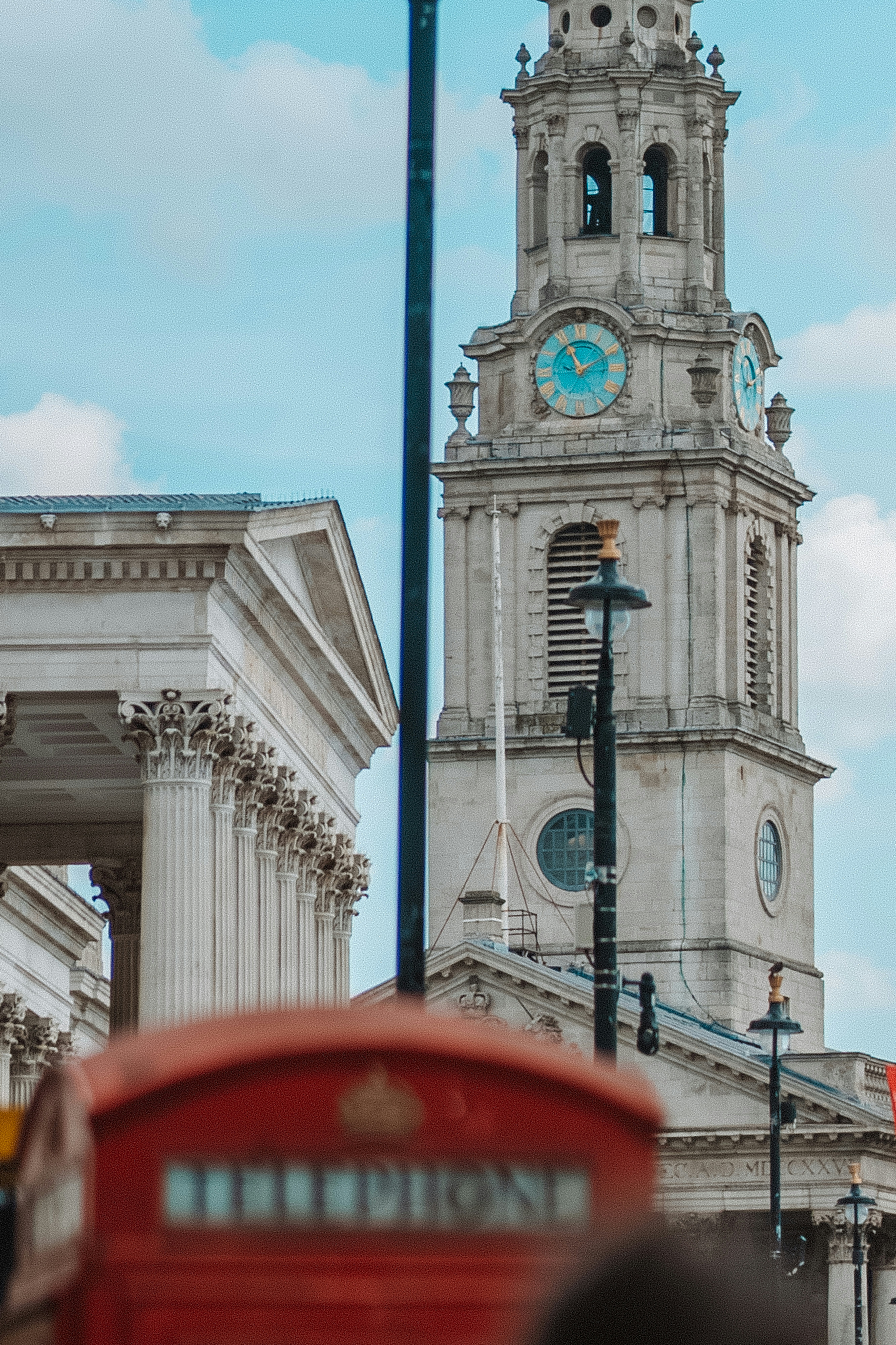 A tall clock tower towering over a city