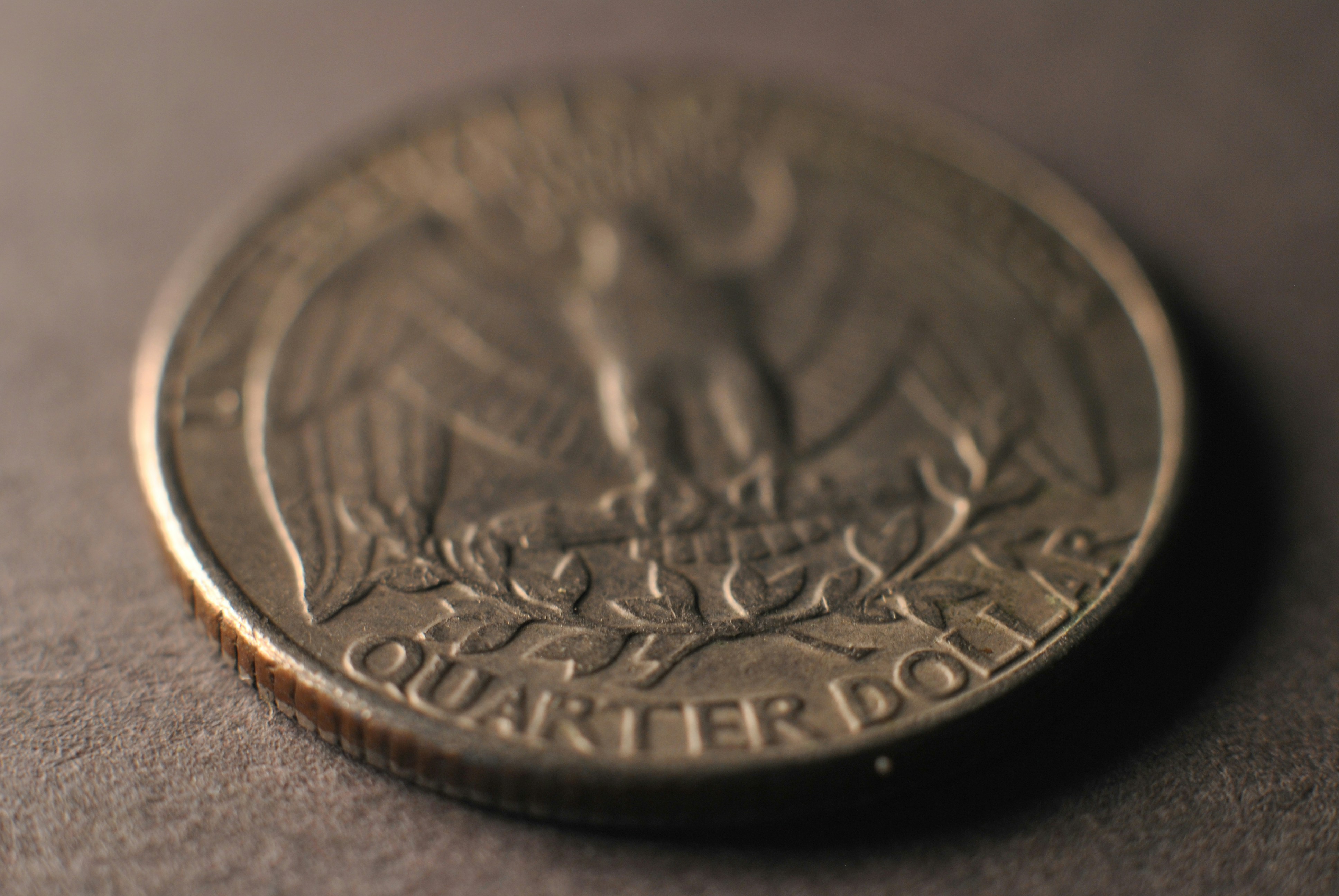 A close up of a coin on a table