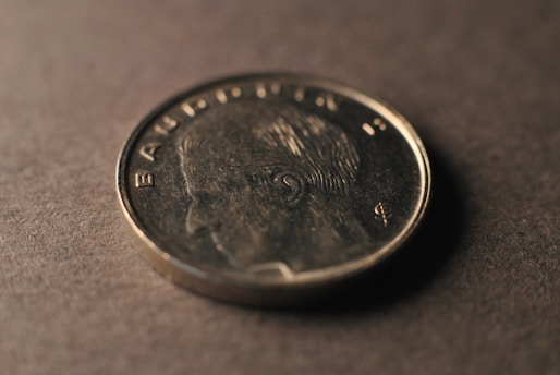 A close up of a coin on a table