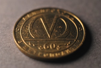 A close up of a coin on a table
