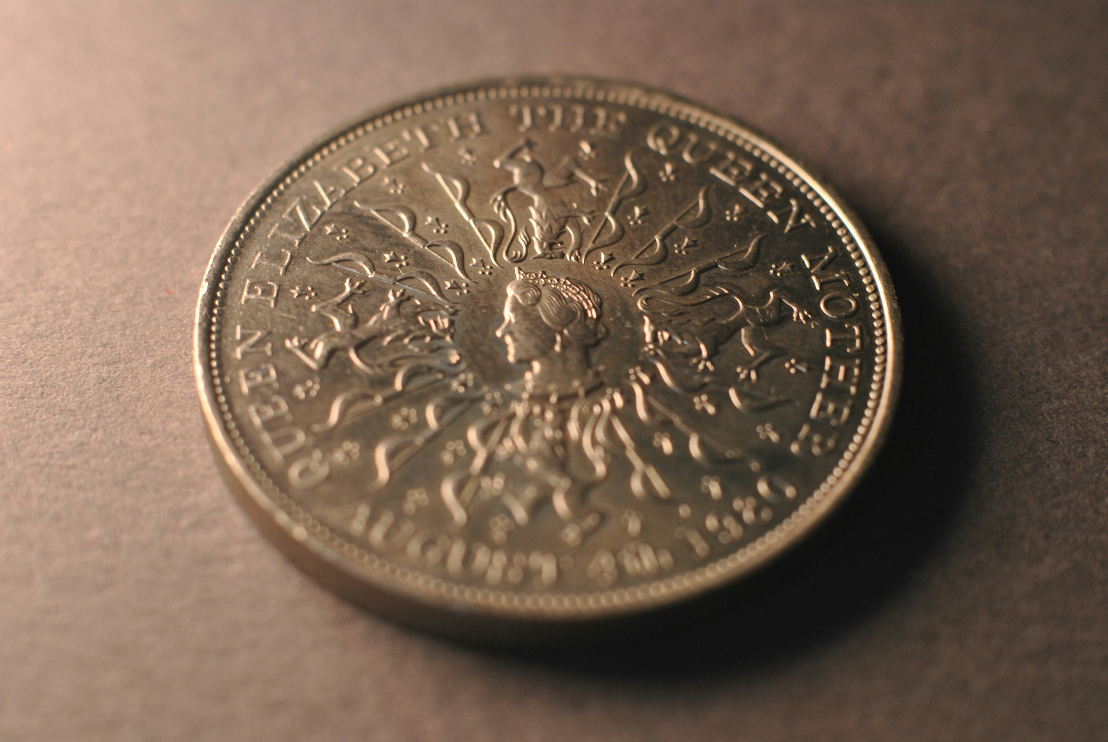 A close up of a coin on a table