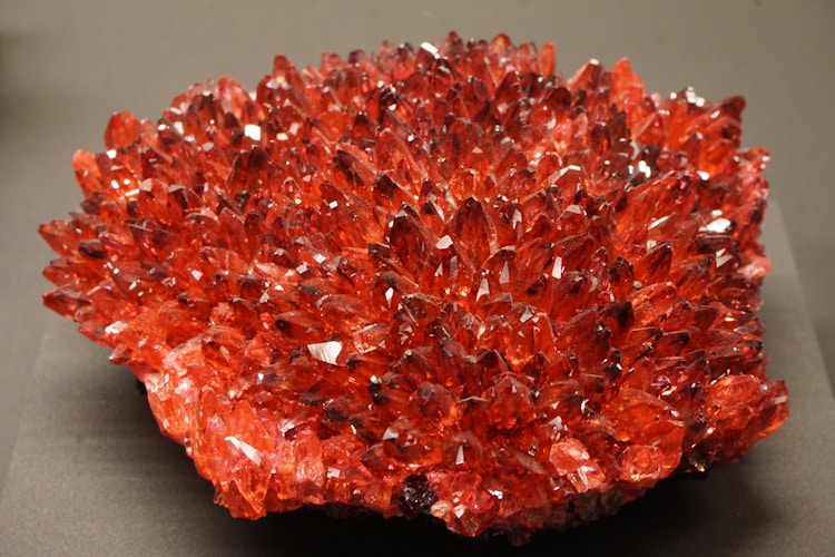 A red rock sitting on top of a table